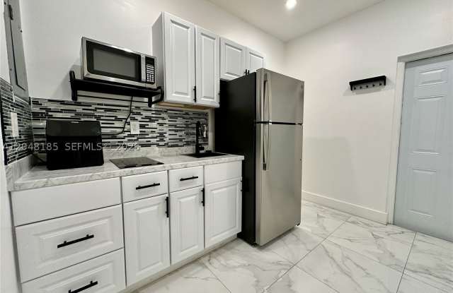 1309 NW 55th Ter photos photos