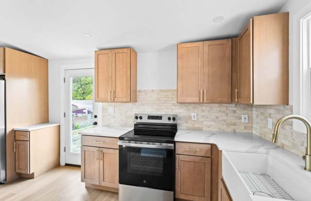 Fully Renovated 3-Bedroom Home with Stunning New Kitchen & Finished Bonus Attic Gallery 1