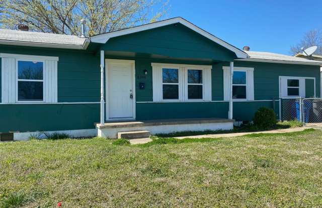 4-Bed, 2-Bath Beauty with Tile Showers & Fenced Yard! Gallery 1