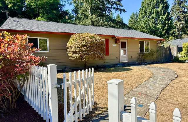 Charming Mid-Century Rambler: Original Hardwoods & Fenced Yard – Close to Light Rail! Gallery 1