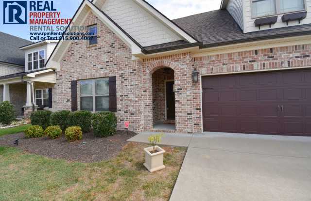 All brick 4 bedroom home plus Bonus room! Garage and covered patio! photos photos
