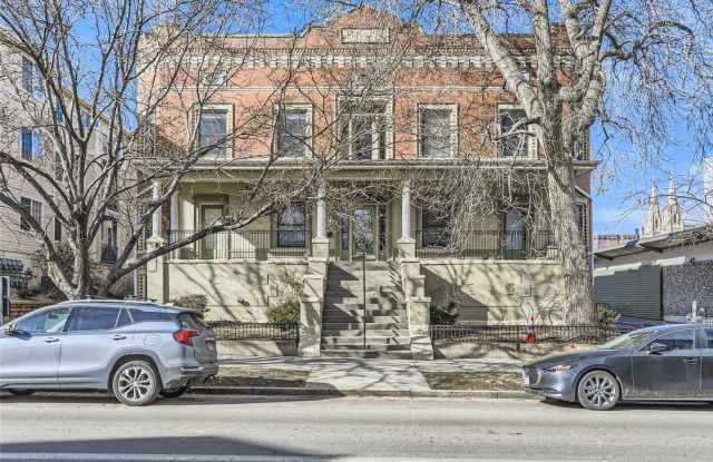 PRICED REDUCED!! Large windows and exposed brick wall photos photos
