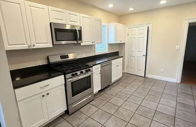 No Fee Single Family House with 5 Parking Spaces Included!  Laundry in Unit! photos photos