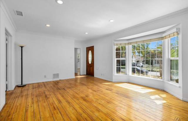 Corner lot home on a classic tree lined Beverly Hills street photos photos