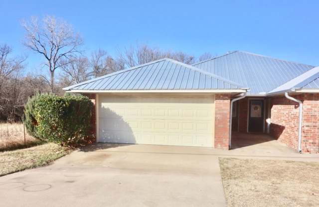 FOR LEASE! Nicely Remodeled 3 BR - 2 BA Brick Duplex With a 2 Car Garage in Weatherford. photos photos