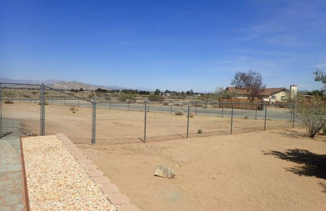 4 Bedroom 2 bath with admirable amount of fenced in property. Gallery 4