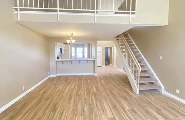 South Coast Springs: Dual Master 2 Bedroom 2 Bath Attached Townhouse With Loft, - 3740 South Bear Street, Santa Ana, CA 92704