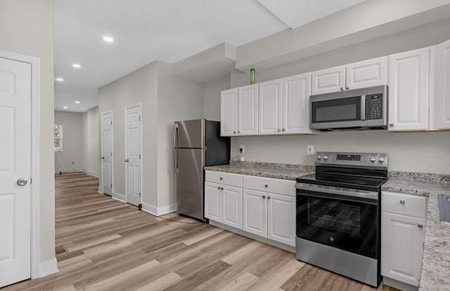 Beautiful Newly Renovated 3 Bedroom with a Large Basement For Rent in Mill Hill District of Baltimore. photos photos