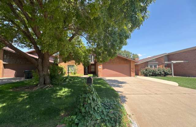 Two-story, four-bedroom, three-bathroom home with a golf course view. photos photos