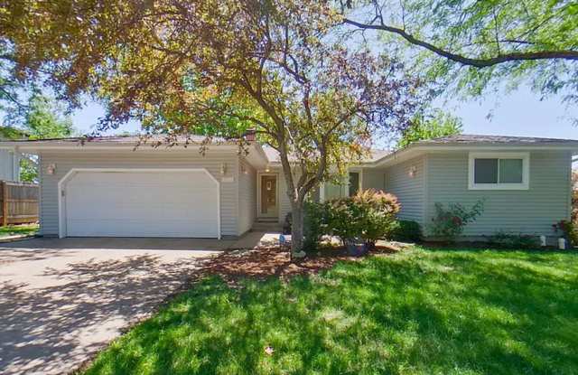 Spacious West Manhattan Home with Fenced Yard, Basement & Bonus Room! photos photos
