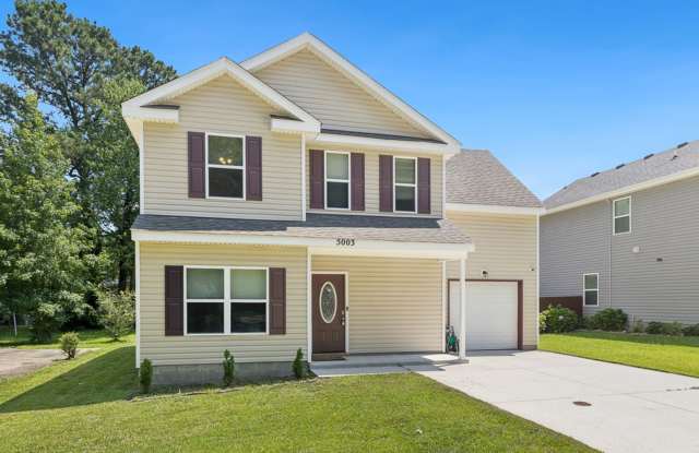 Space, comfort, and versatility come together in this 5 bedroom, 3 bathroom home for rent in Western Branch. photos photos