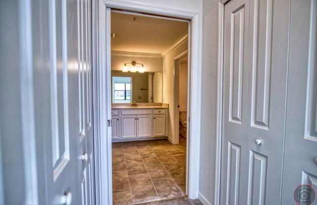 Annual Unfurnished Rental – Coach Home 3 Bedrooms, 2 Baths, 2 Car Garage, with Resort Like Amenities – Gran Paradiso Community! photos photos