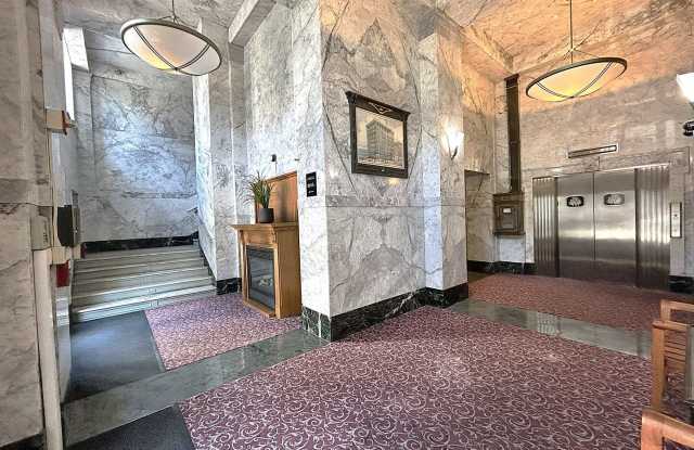 Unique home nestled in a Historic building w/ dedicated parking! photos photos
