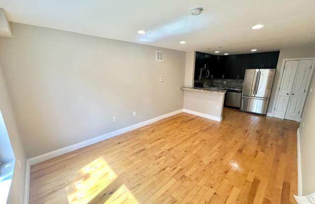 Spacious 3-Bedroom, 2-Bath Apartment with Finished Basement, Private Patio, and In-Unit Laundry photos photos