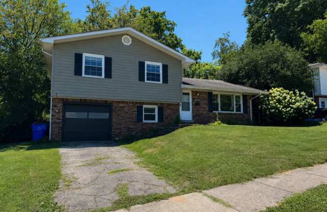 AVAILABLE NOW! Spacious 4 BR, 2 Bath House! Wood Floors, Attached Garage, W/D Included photos photos