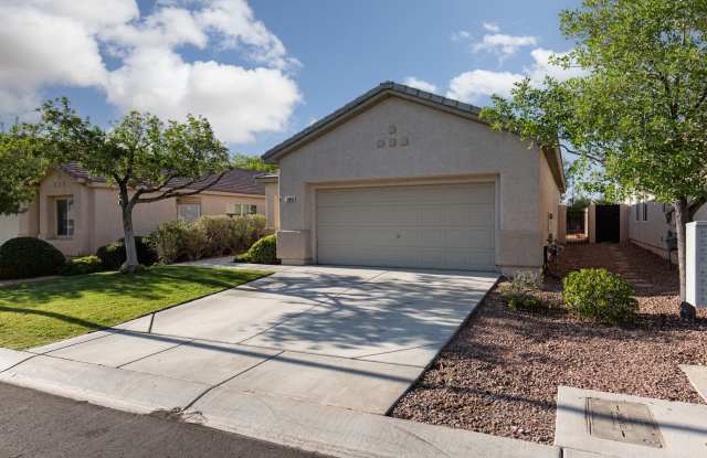 Wonderful Summerlin single story with grass backyard and island kitchen. photos photos