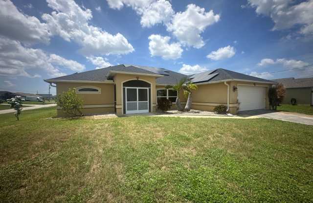 4 Bedroom plus Den - 2 Bathrooms - 2 Car Garage- Screen Lanai - Corner NW Cape Coral Home photos photos