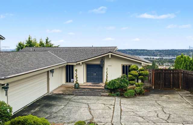 Sweeping Skylines & Modern Mid-Century Luxury in Bellevue! Gallery 1