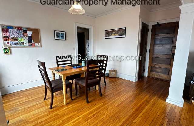 3rd Floor Corner Unit, SE Sun, Lakes Uptown Apartment, Blocks from Both Lakes, Hardwood Floors, One Month Free Gallery 3