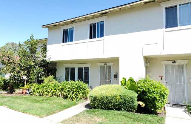 Spacious 2-Story Townhome, Fresh Paint, New Carpet, Wood Floor Downstairs, Patio, Dual Pane, Washer/Dryer Hookups! Gallery 1