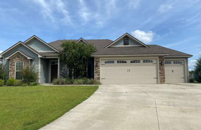 Spacious 4-Bedroom Home with 3-Car Garage, Screened Porch & Fenced Yard in Ivy Gate Gallery 1