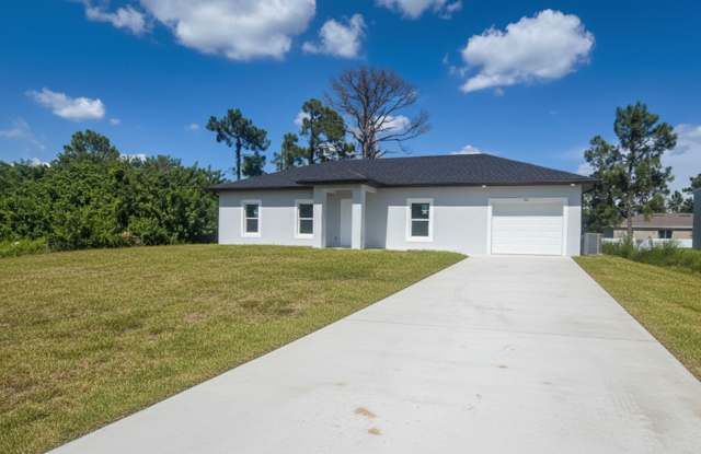 COMING SOON---BRAND NEW 3/2/1 -GREAT LOCATION IN SW LEHIGH ACRES photos photos