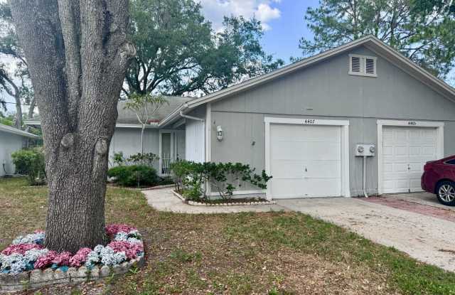 2/1 Townhome Located in Carrollwood WITH Garage and Porch! photos photos