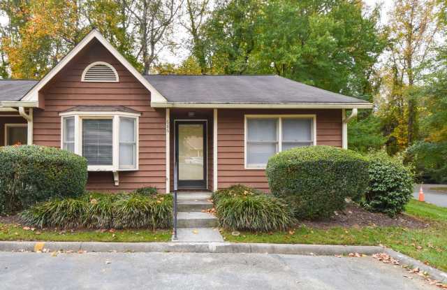 3 bedrooms, 2 bath one level town-home with vaulted living room opens to the deck. Conveniently located near restaurants, and shopping. - 686 Rock Garden Circle, Winston-Salem, NC 27104