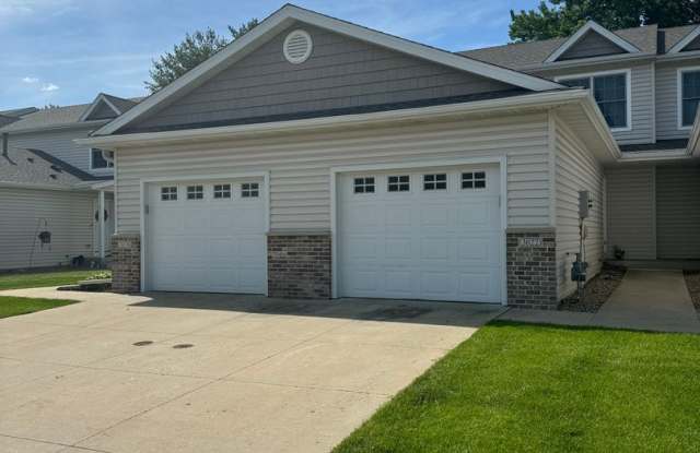 NW Townhouse Enjoy comfortable living in this 2-bedroom, 1.5-bathroom attached 1 car garage just in time for winter! Gallery 1