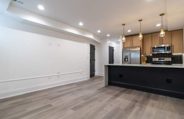 Contemporary 2-Bed, 2-Bath Garden Apartment in Uptown – Move-In Ready! photos photos