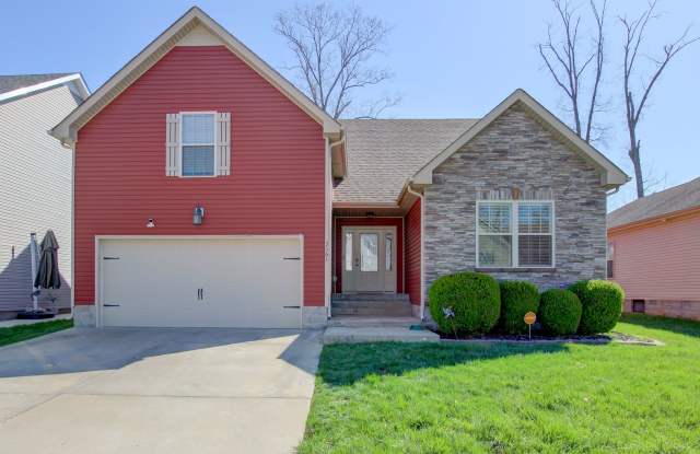 Fantastic Open Floor Plan Home With Stone Front Fireplace, Stainless Steel Appliances, And Close to Restaurants, Shopping and Fort Campbell. photos photos