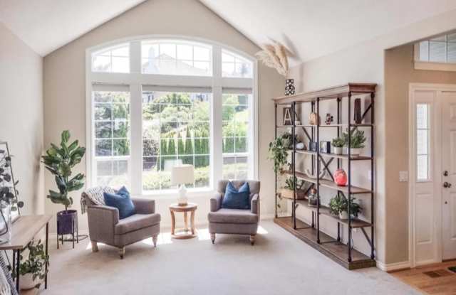 Wonderful 4 bed, 3 bath house with Eco friendly Solar Panels - Get Half Off Your First Month's Rent! photos photos