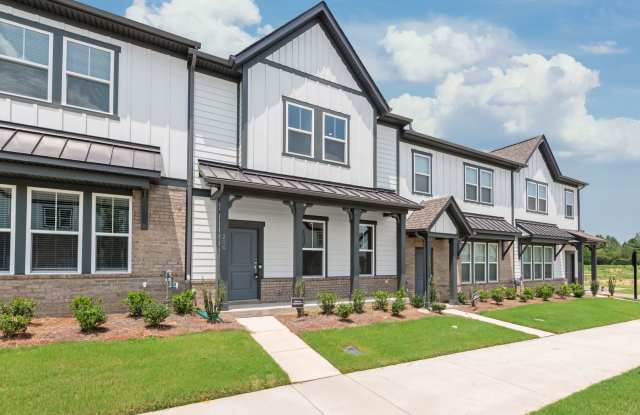 Welcome home to this stunning brand-new townhome in one of Indian Trail's newest and most desirable communities! photos photos