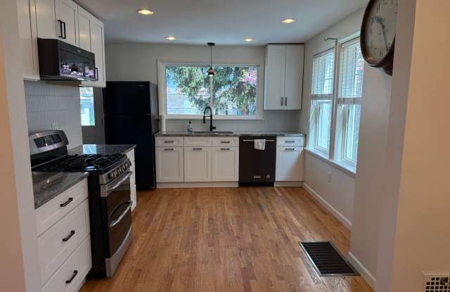 Newly Renovated 3-Bedroom, 1-Bathroom End-Row Townhome with Bonus Room & Backyard! photos photos