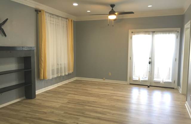 Midtown 2 story condo. Over 1200 sq ft of living space! Fenced in back yard! Pets are owner's approval, fees apply. photos photos