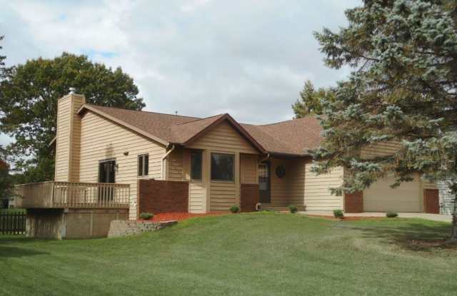 Spacious 4-Bedroom Home with Fireplace and Fenced Backyard on Quiet Cul-de-Sac - 3390 Whispering Pines Lane, Eau Claire, WI 54701 Spacious 4-Bedroom Home with Fireplace and Fenced Backyard on Quiet Cul-de-Sac - 3390 Whispering Pines Lane, Eau Claire, WI 54701