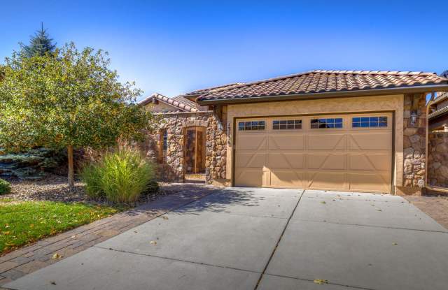 Luxury Golf Course Ranch Walkout in Flying Horse | Stunning AFA & Mountain Views Gallery 1
