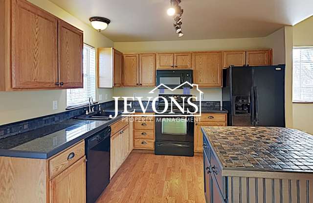 Charming duplex just steps from transit, parks, and shopping - Includes garage, full bathrooms, and patio access photos photos
