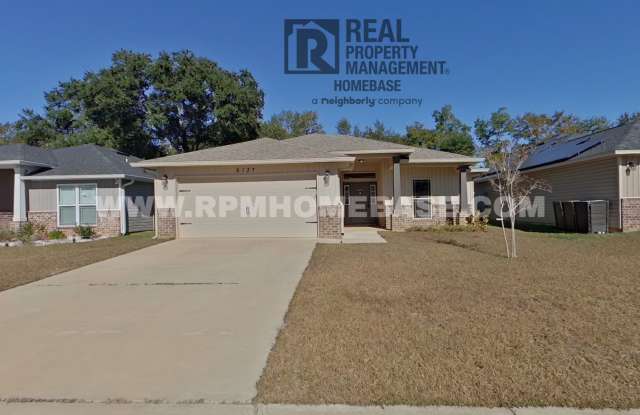 Spacious 4-Bedroom Home with Screened Porch in Pace photos photos