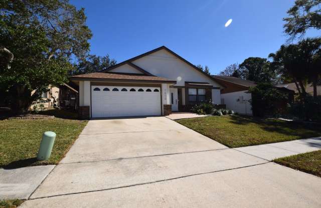 This charming 3 Bedroom, 2 Bath Single Family Home For Rent at 7313 Spring Villas Circle Orlando, FL 32819 photos photos