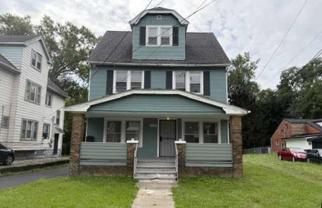 Must-See 5-Bedroom Home with a Large Kitchen, Two Full Bathrooms and Updated Driveway photos photos