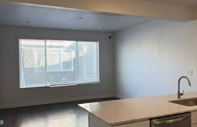 $1,000 Move-In Credit - Move-In Ready 3-Bedroom Bluffdale Townhome with Private Side Yard Gallery 4