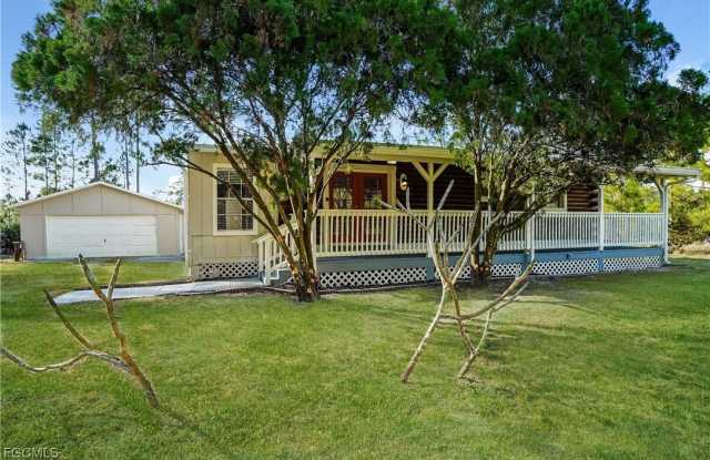 1219 Thompson Avenue - 1219 Thompson Avenue, Lehigh Acres, FL 33972
