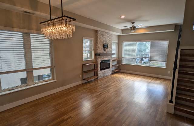 STUNNING 4-LEVEL TOWNHOME IN HIGHLANDS W/ 2-CAR GARAGE +AMAZING ROOFTOP DECK WITH VIEWS! Gallery 4
