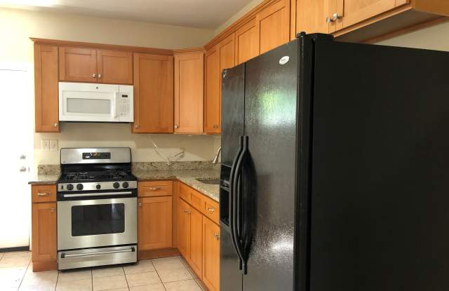 Fantastic 4 Bedroom/ 1 Bath Renovated Home! New Spacious Kitchen! Off-Street Parking! photos photos