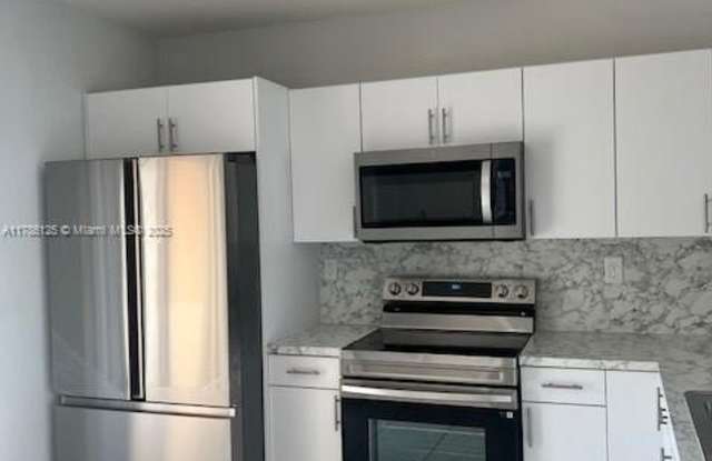 120 E 5 ST photos photos