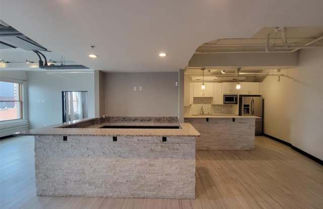 Luxurious 2 bedroom, 2 bathroom condo located in downtown ABQ! ALL utilities included! HUGE price reduction! Showings available! photos photos