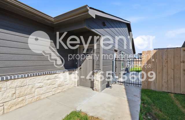 New 3-Bedroom Duplex with 2-Car Garage, Fenced Yard & Lawn Care Included Gallery 3