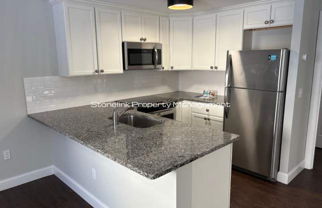 Fully Renovated Townhouse Style Condo For Rent in Newport! photos photos