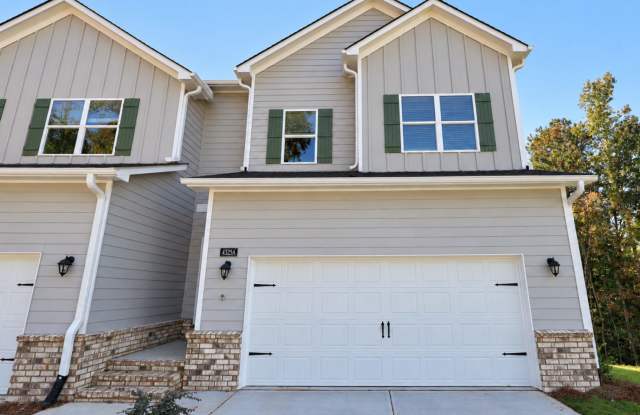 Now Leasing: Spacious 4-Bedroom Townhomes in Oakwood Gallery 1